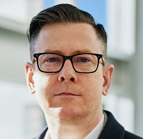 Alexander Hughes, CEO y directivo de una empresa de crypto trading, retrato